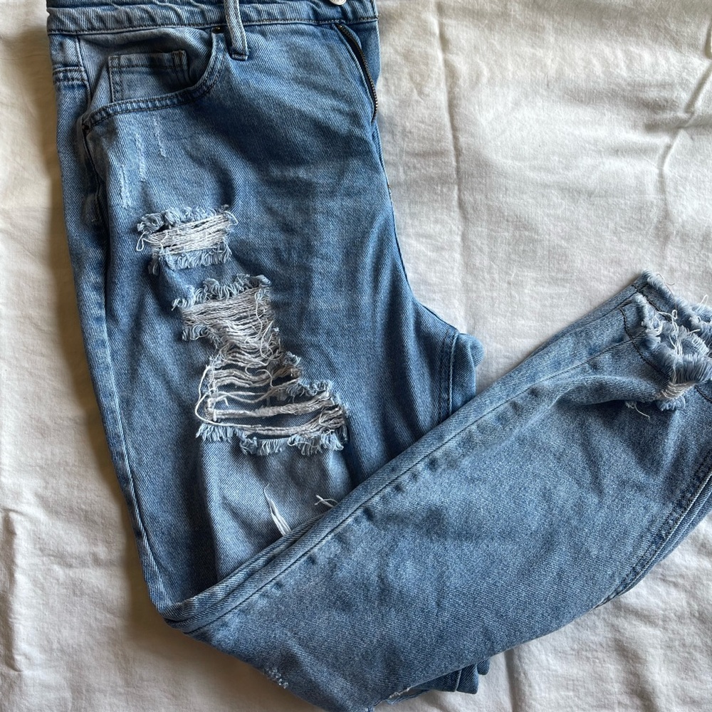 High waisted distressed jeans